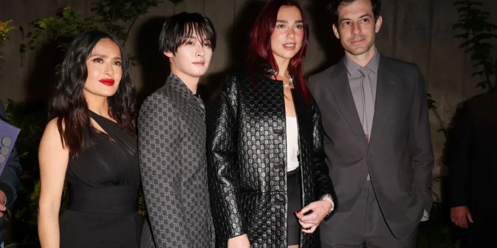 Lee Know at Gucci Cruise 2025 fashion Show with DUa Lipa, Salma Hayek, and Mark Ronson