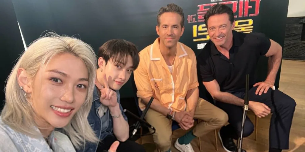 Stray Kids Felix and Bang Chan with Ryan Reynolds and Hugh Jackman