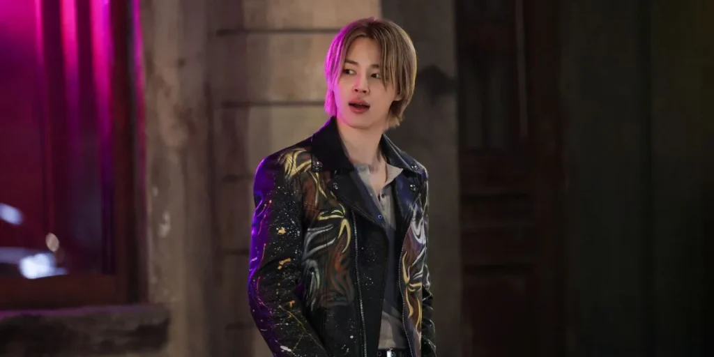 Jimin in a still from 'Who' MV