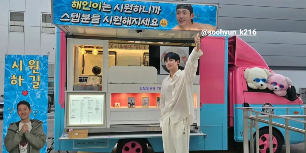 Jung Hae In posing in front of coffee truck sent by Kim Soo Hyun