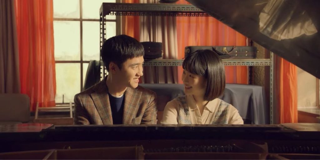 EXO's D.O. and Won Jin Ah in a still from Secret Untold Melody trailer