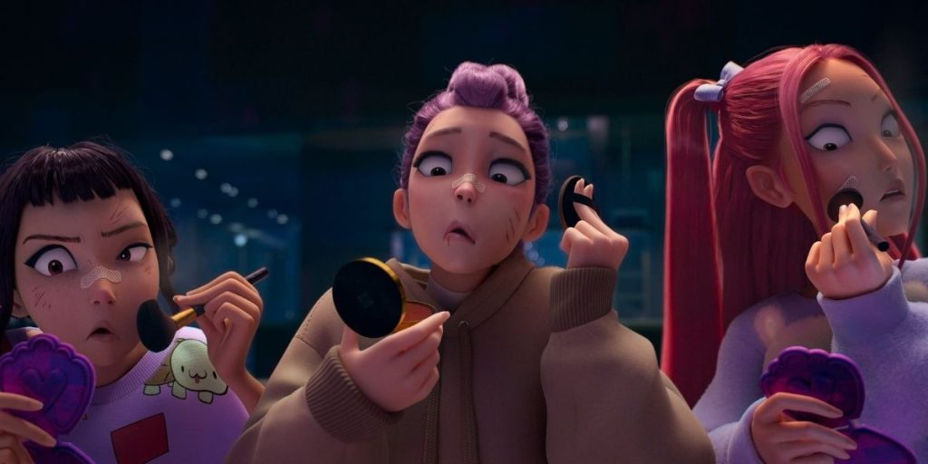 Rumi, Zoey, and Mira from HUNTRX in a still from KPop Demon Hunters