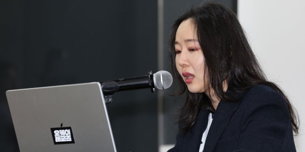 Min Hee Jin holding a press conference